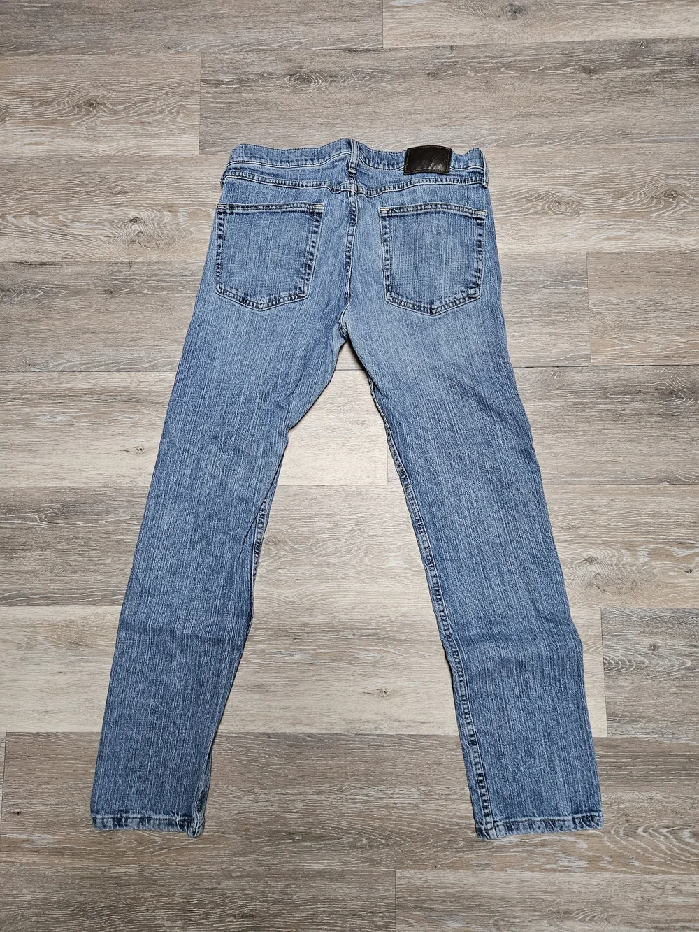 Magellan Outdoors Men's Light Blue Slim Straight Jeans